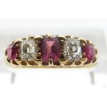 An 18ct gold Victorian ring set with alternating rubies and diamonds, the diamonds approximately 0.