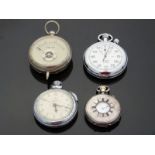 A white metal half hunter pocket watch with keyless wind movement and white enamel dial with Roman
