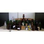 A collection of small vintage bottles including poison