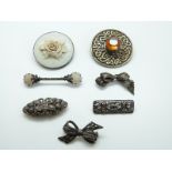 Two silver brooches set with marcasite in the form of bows,