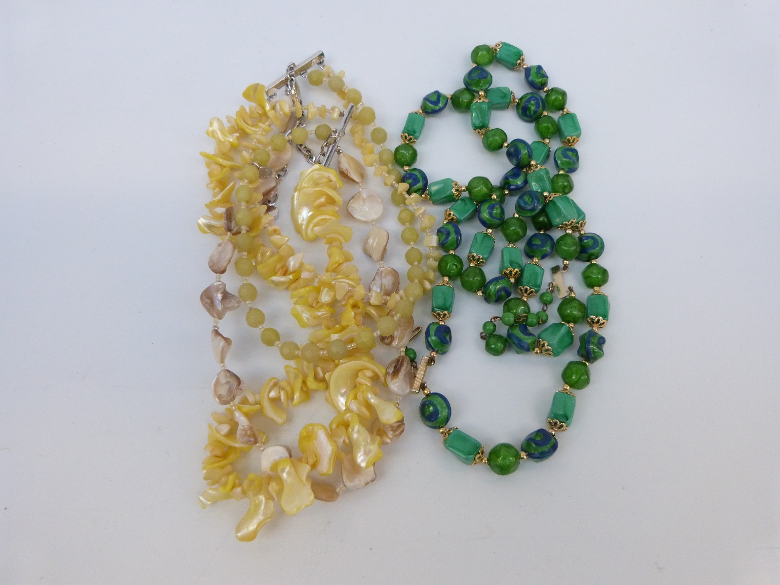 A collection of costume jewellery to include necklaces, - Image 16 of 17