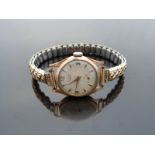 Eton 18ct gold ladies wristwatch with subsidiary seconds dial, gold hands and arrow markers,