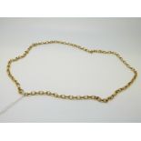 A yellow metal necklace marked 750, made up of oval links, 20.