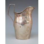 A Russian white metal jug, with Russia 84 silver marks for St Petersburg,