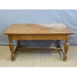 An oak kitchen table with single drawer,