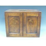 A Victorian mahogany surgeon's or similar campaign chest, having folding carry handle,
