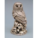 A hallmarked silver figure of an owl, height 7.