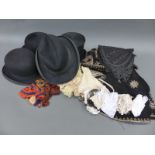 A Victorian silver thread embroidered cloak, top hat, bowler hats,