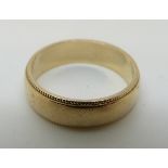 A 9ct gold wedding band, 3.