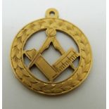 An 18ct gold Masonic fob,