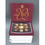 Four Royal Mint deluxe proof coin sets for 1997, 1999, 2001 and 2002,