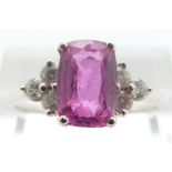 An 18ct white gold ring set with a pink sapphire of approximately 1.
