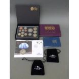 A collection of coin sets and modern crowns to include Millennium £5 cover, uncirculated 1970 set,