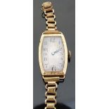 Tavannes 18ct gold ladies wristwatch with blued Breguet hands, black Arabic numerals, silvered face,