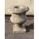 A small marble urn,