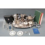 A quantity of silver plated ware to include twin handled tray, teaware, toast rack, coins,