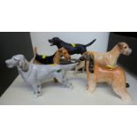 Four Beswick dogs including English Setter, Afghan Hound, and Boxer,