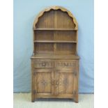 A Dutch style elm dresser with plate rack to top,