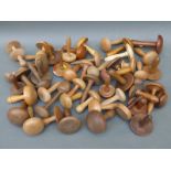 Approximately 50 19th and 20thC turned wood/treen darning or sewing mushrooms including boxwood,