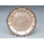 A Danish white metal tray with shaped edge, with Danish silver marks for 1936,