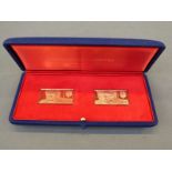 A pair of Metalimport Ltd 18ct gold Sir Winston Churchill stamp replicas in presentation case with