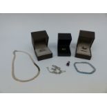 A collection of silver jewellery to include necklace, a bracelet set with topaz, chain, pendant,