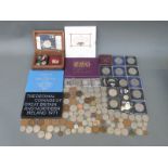 A UK coin collection comprising four Royal Mint brilliant uncirculated coin sets,