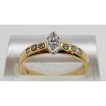 An 18ct gold ring set with a marquise cut diamond, size M, 3.