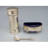 A hallmarked silver open salt with blue glass liner and an A Barrett Piccadilly cylindrical