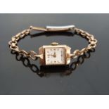 Smiths De Luxe 9ct gold ladies wristwatch with gold hands and arrow markers,