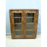 A 19thC flame mahogany two door glazed bookcase,