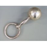 A white metal baby's rattle stamped Tiffany & Co 925 22064703, length 14cm,