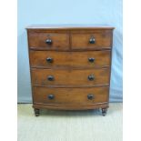 A 19thC bow front chest of two over three graduated drawers,