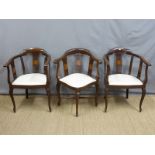 A pair of late 19thC inlaid salon armchairs and a matching corner chair