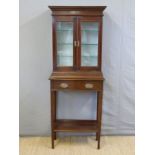 A late 19th / early 20thC display cabinet on stand,