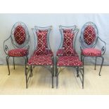 Six (2+4) upholstered wrought iron style chairs