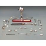 A hallmarked silver vase, sugar nips, golf related spoons, sifter spoon,