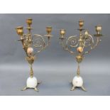 A pair of French brass and alabaster candelabra,