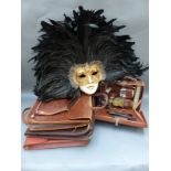 A Venetian feather mask, gents leather vanity case,