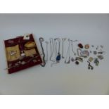 A collection of silver jewellery to include seven necklaces, two bracelets, earrings,