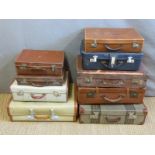Nine various leather and other vintage suitcases,