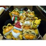 Twenty vintage Garfield soft toys to include 'Cowboy', 'Little Devil', 'Garfield About Town',