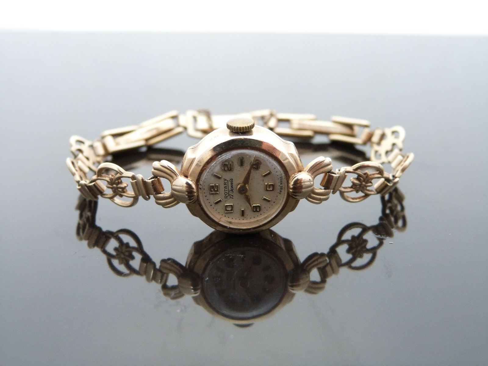 Rotary 9ct gold ladies wristwatch with gold hands, Arabic numerals,