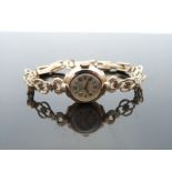 Rotary 9ct gold ladies wristwatch with gold hands, Arabic numerals,