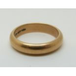An 18ct gold wedding ring,