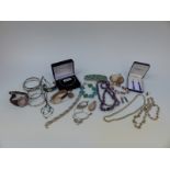 A collection of silver jewellery including a watch, Alpaca brooch and bracelet,
