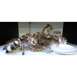 Four Italian large leopard figures and a dish with figural leopard