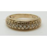 A 9ct gold ring set with diamonds, 3.