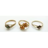 Two 9ct gold rings one set with garnets and a 9ct gold ring set with citrines, size N, Q and P/Q, 6.