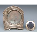 An Edwardian VII embossed hallmarked silver picture frame with a nightingale and crescent moon,